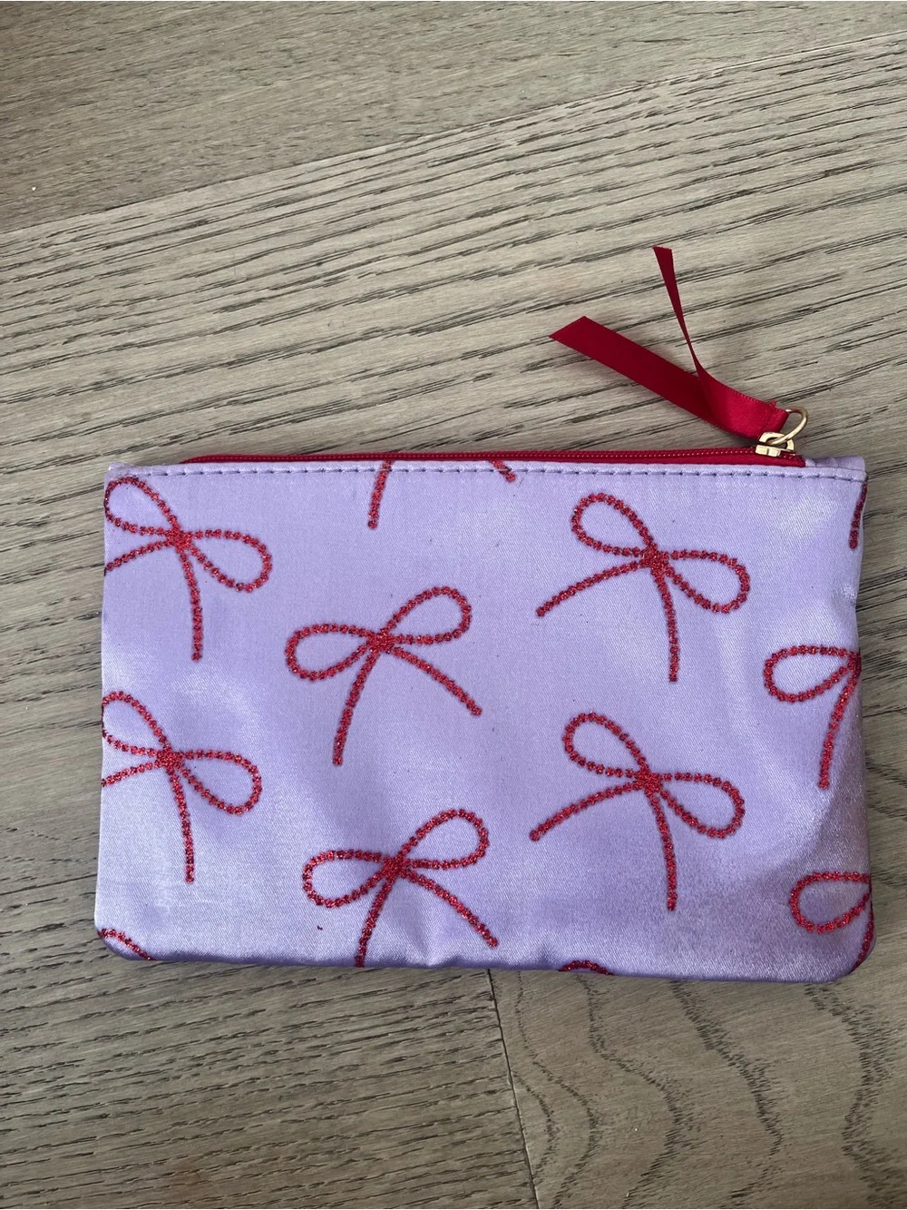 Lilac Satin Pouch with Red Bow Print